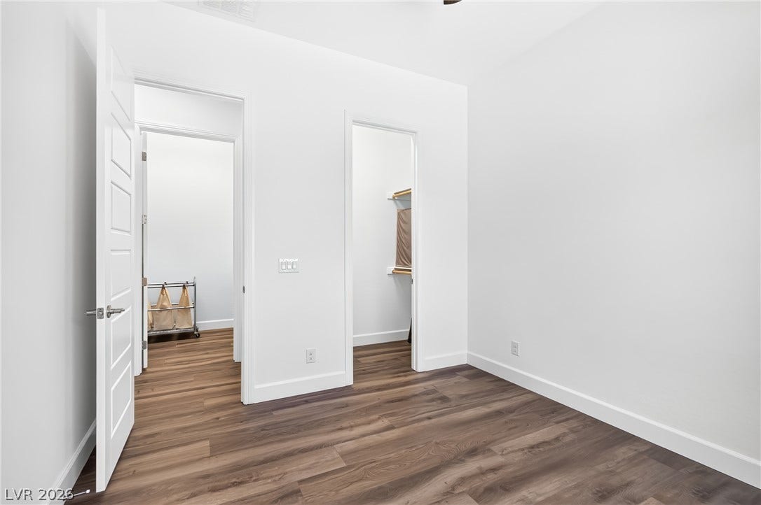 29 Porto Malaga Street, Henderson, NV 89011 Streamlined flooring guides you through this adaptable space, perfect for any vision.