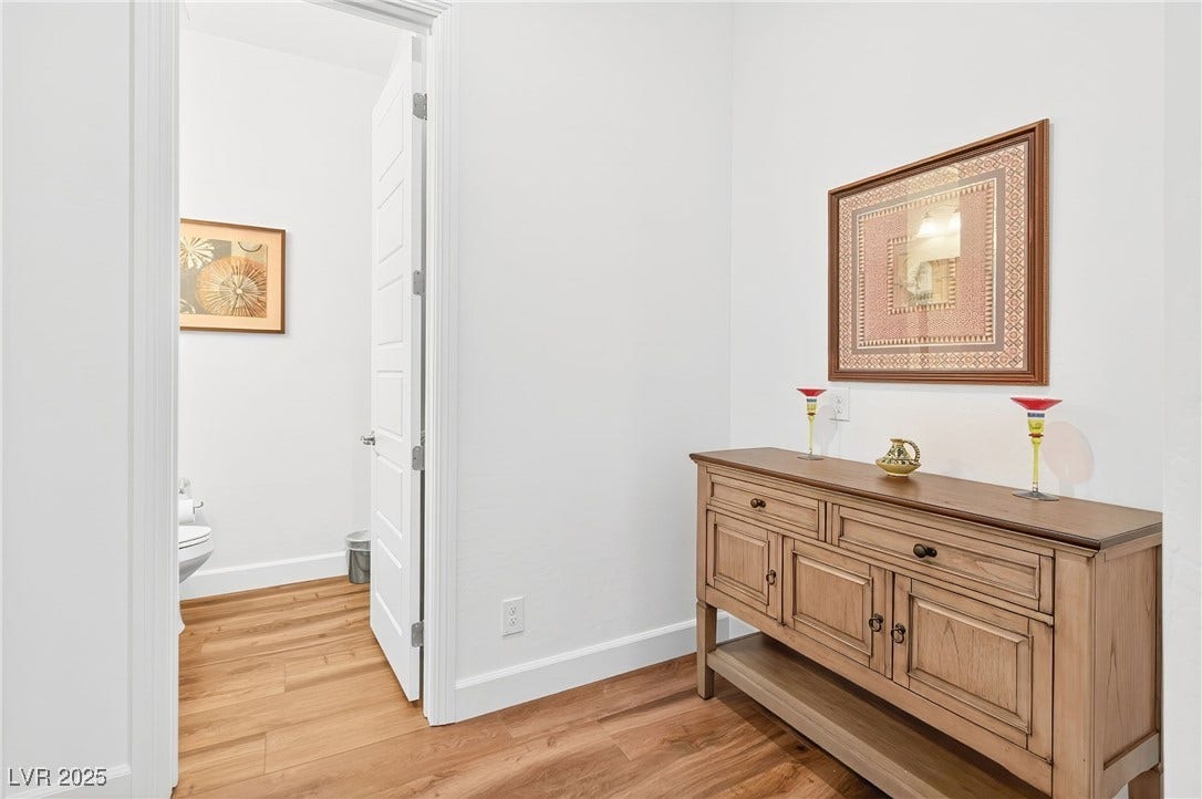 29 Porto Malaga Street, Henderson, NV 89011 A convenient powder room with a functional layout designed for everyday comfort.