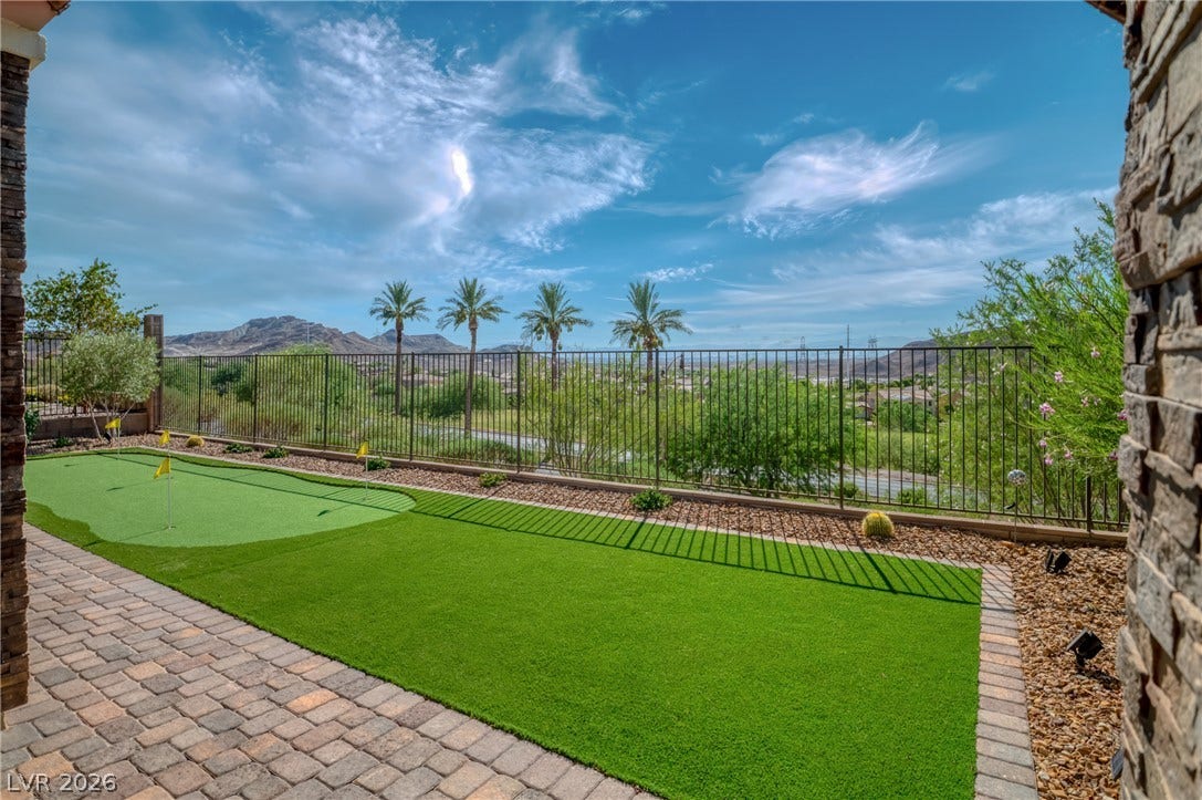 29 Porto Malaga Street, Henderson, NV 89011 A private putting green complements this desert oasis with distant mountain view magnificent strip views, especially at night when the city comes alive