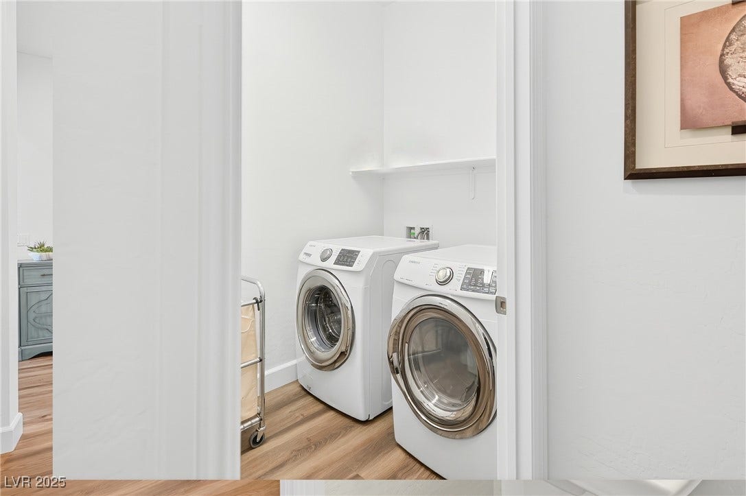 29 Porto Malaga Street, Henderson, NV 89011 A functional laundry room designed for everyday convenience, offering ample space for chores and household organization.