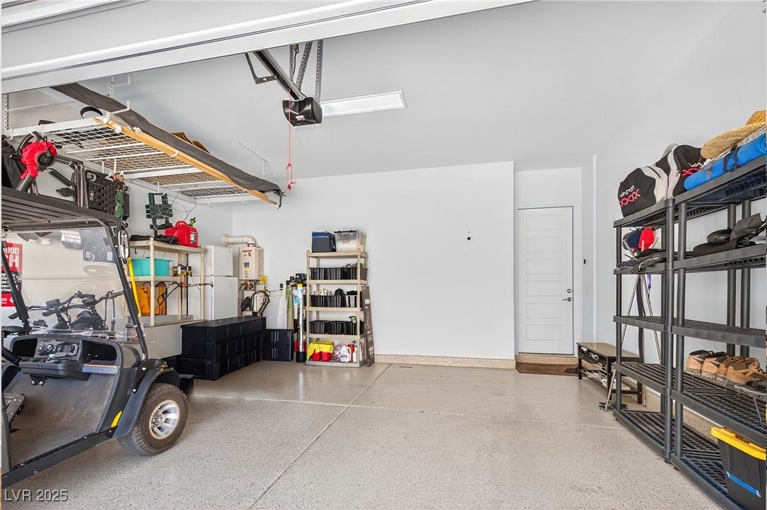 29 Porto Malaga Street, Henderson, NV 89011 Enjoy a spacious garage offering plenty of room for parking, storage, and everyday convenience.