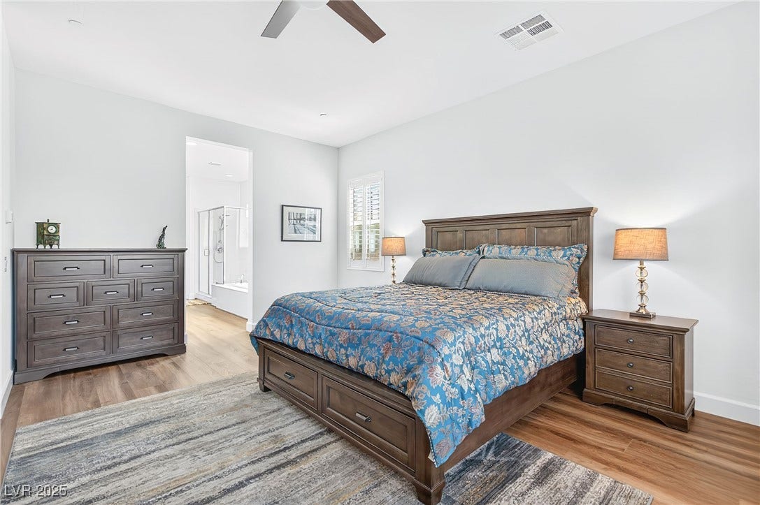 29 Porto Malaga Street, Henderson, NV 89011 A spacious primary suite designed for comfort and relaxation.