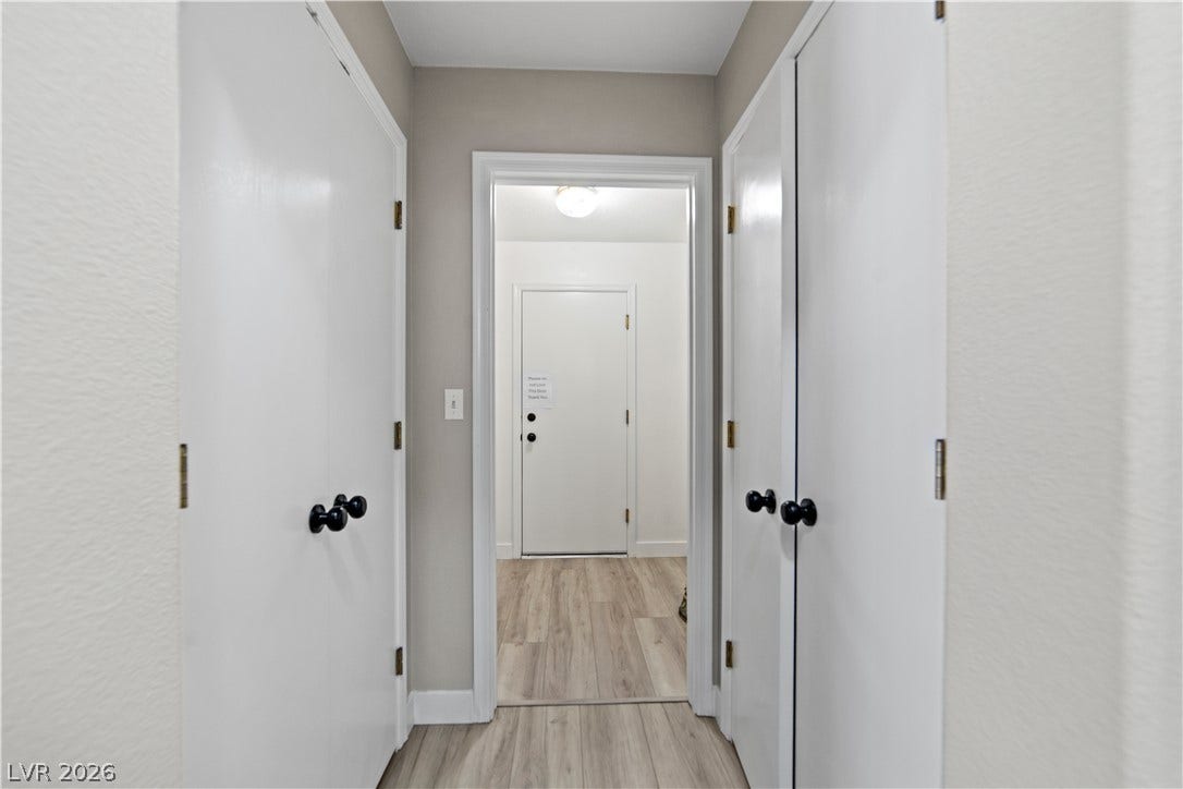 2154 High Mesa Drive, Henderson, NV 89012 A well-maintained hallway with durable plank flooring welcomes residents and guests.