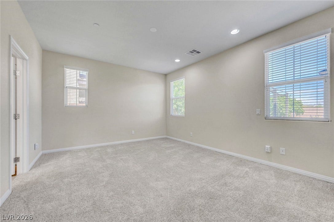 3086 Ripe Peak Lane, Henderson, NV 89044 This airy room offers a tranquil retreat with ample natural light.