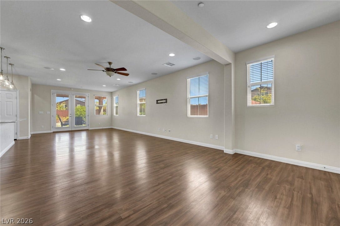 3086 Ripe Peak Lane, Henderson, NV 89044 Bright and airy living area with gleaming floors and ample natural light.