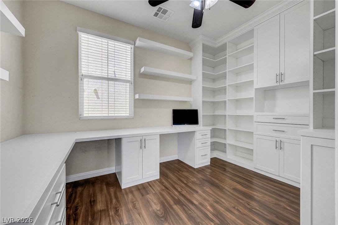 3086 Ripe Peak Lane, Henderson, NV 89044 This versatile space offers built-in storage and sleek flooring, ideal for a productive office.