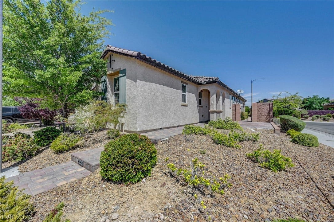 3086 Ripe Peak Lane, Henderson, NV 89044 This charming home offers attractive curb appeal with thoughtful landscaping and a welcoming entrance.