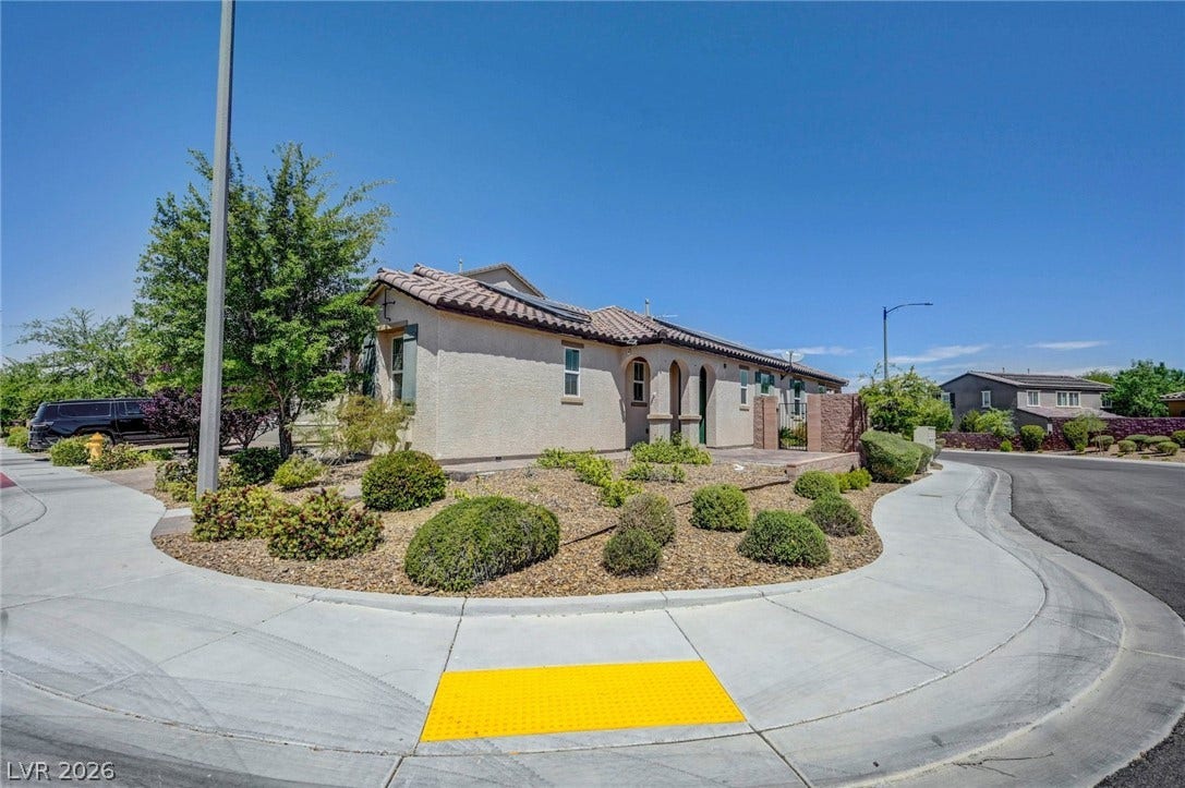 3086 Ripe Peak Lane, Henderson, NV 89044 This charming home features classic architecture and mature landscaping.