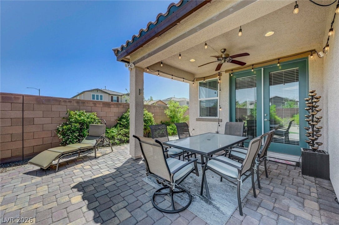 3086 Ripe Peak Lane, Henderson, NV 89044 This paved patio offers an inviting outdoor retreat for relaxation and entertainment.