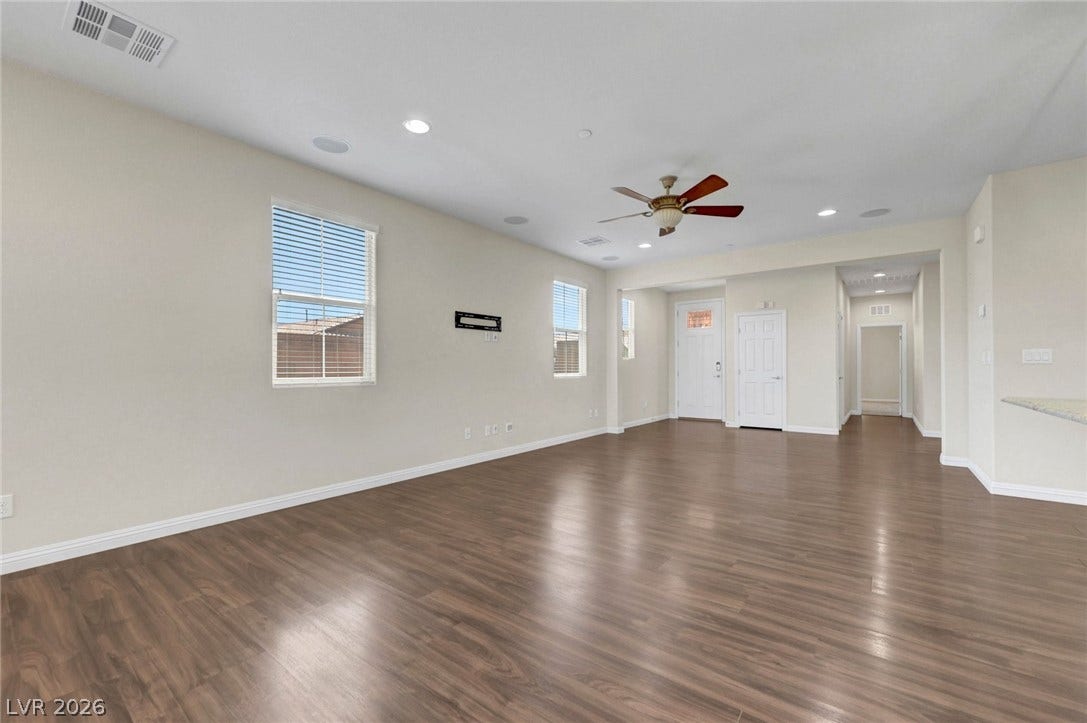 3086 Ripe Peak Lane, Henderson, NV 89044 This expansive living area offers versatile design possibilities with beautiful flooring.