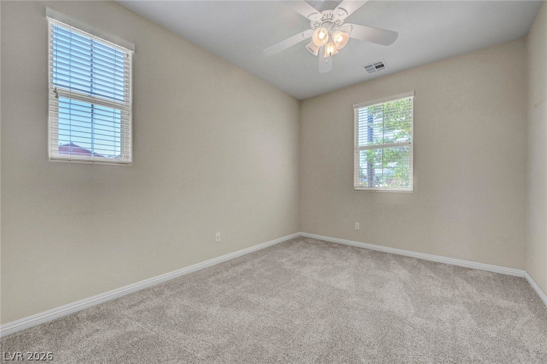 3086 Ripe Peak Lane, Henderson, NV 89044 This versatile bedroom offers comfort and a blank canvas for personalization.