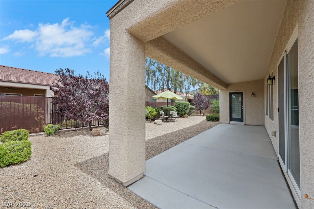 2408 Black River Falls Drive, Henderson, NV 89044 This outdoor patio offers a serene space for relaxation and enjoyment.