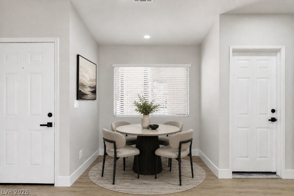 529 Close Avenue, Henderson, NV 89011 This bright dining area features ample natural light and clean, classic finishes.