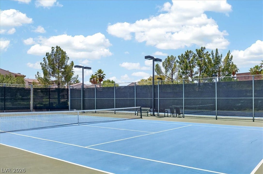 1116 Strada Cristallo, Henderson, NV 89011 Well-maintained tennis courts ready for competitive play under sunny skies.