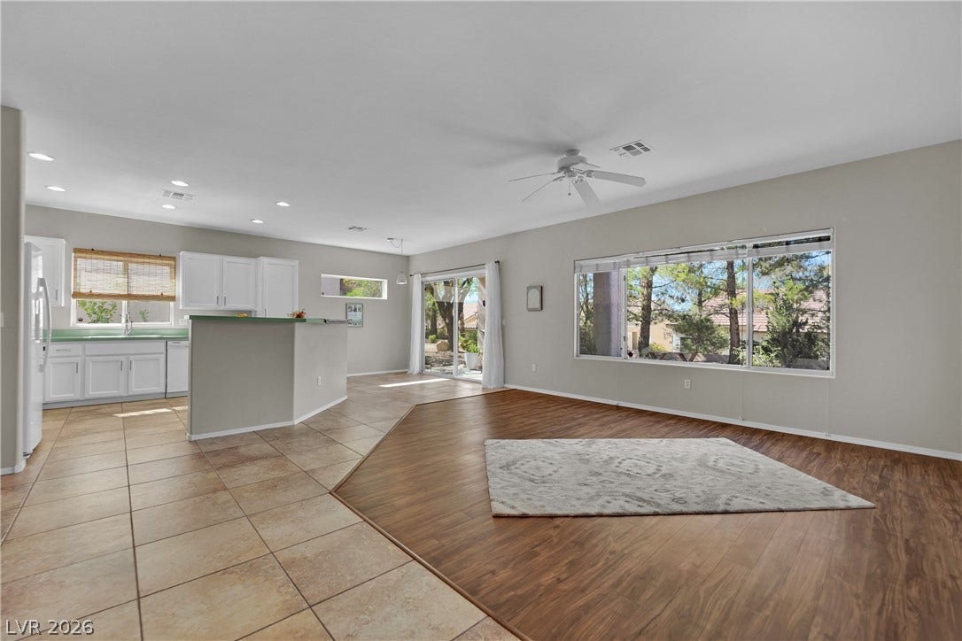 This bright interior features an open-concept living space with ample natural light.
