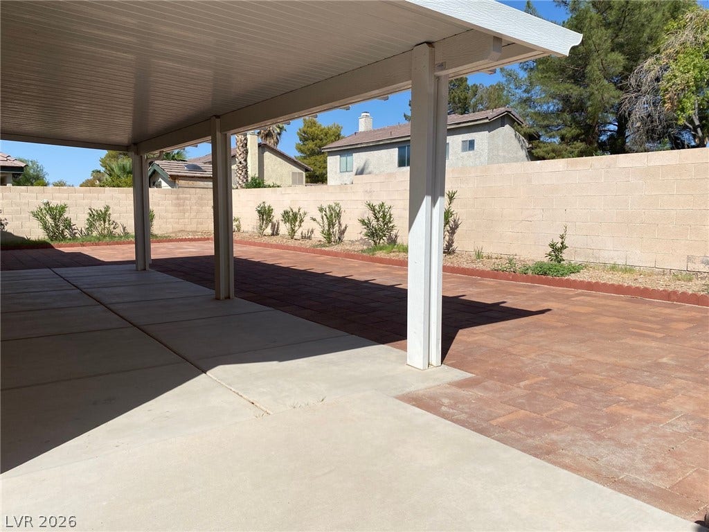 2340 Viewcrest Road, Henderson, NV 89014 This spacious outdoor area features a covered patio, ideal for relaxation and entertaining.