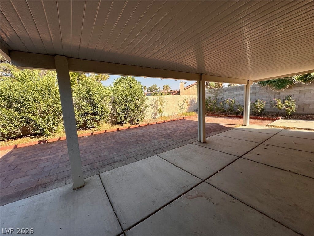 2340 Viewcrest Road, Henderson, NV 89014 This spacious covered patio offers a refreshing outdoor retreat, perfect for relaxation or entertainment.