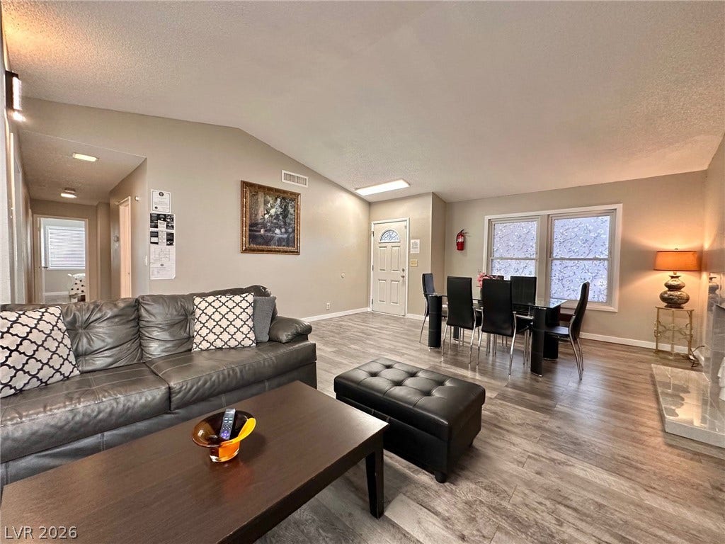 2340 Viewcrest Road, Henderson, NV 89014 This inviting space offers an open layout, ideal for both entertaining and daily living.