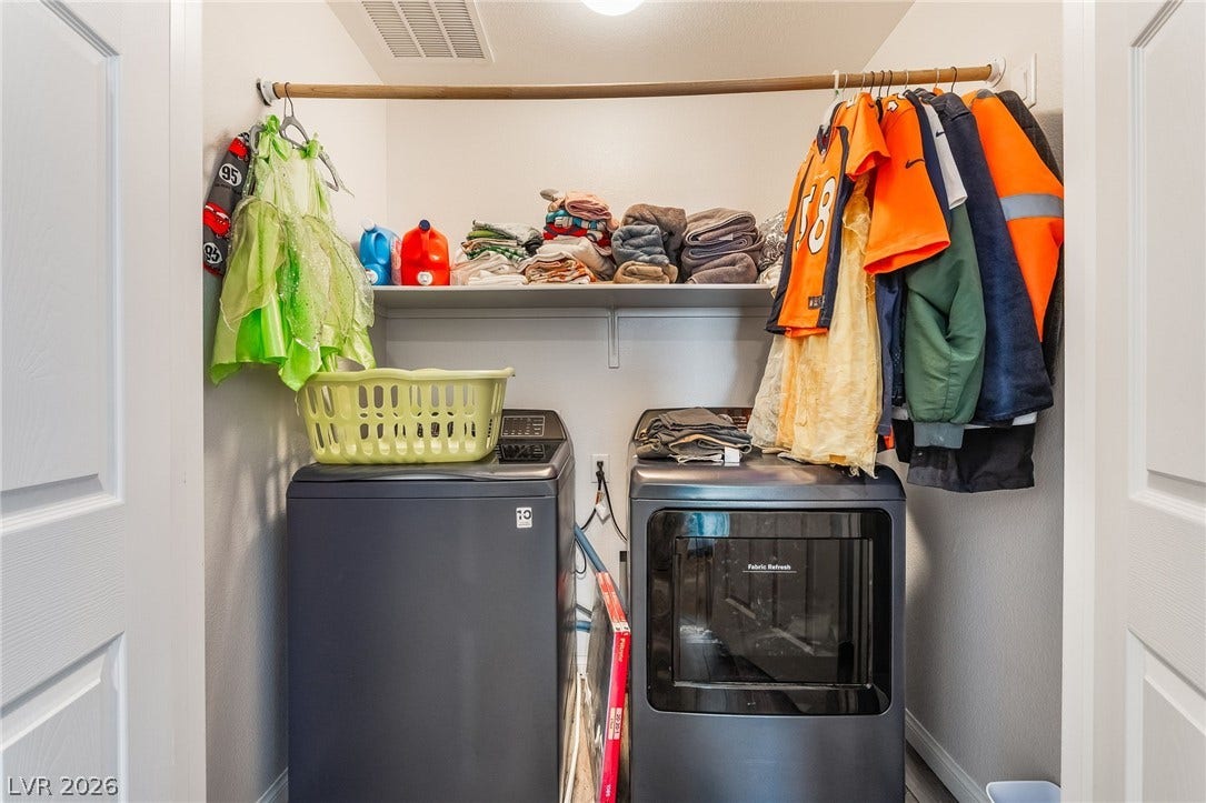 360 Misterioso Street, Henderson, NV 89011 This dedicated laundry space combines efficiency with smart design, making chores effortless.