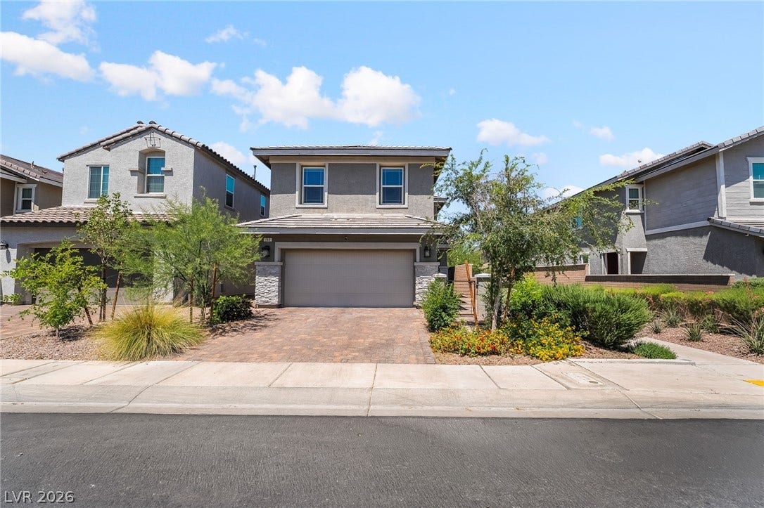 360 Misterioso Street, Henderson, NV 89011 This charming home offers curb appeal and a convenient attached garage.