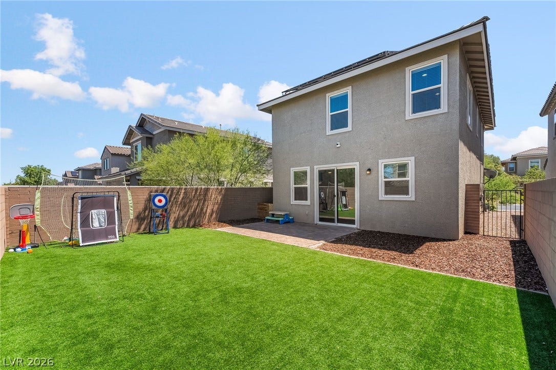 360 Misterioso Street, Henderson, NV 89011 This outdoor space features a private yard with a patio, perfect for enjoying the pleasant weather.