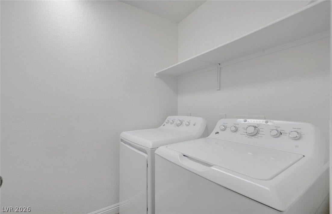 31 Antero Drive, Henderson, NV 89074 A well-lit utility space provides functional laundry appliances and a convenient overhead shelf.