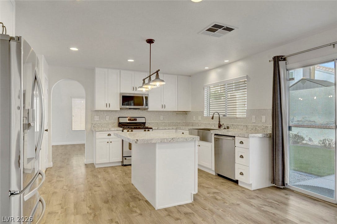 31 Antero Drive, Henderson, NV 89074 A well-appointed kitchen showcasing an island and durable flooring, perfect for daily living and entertaining.