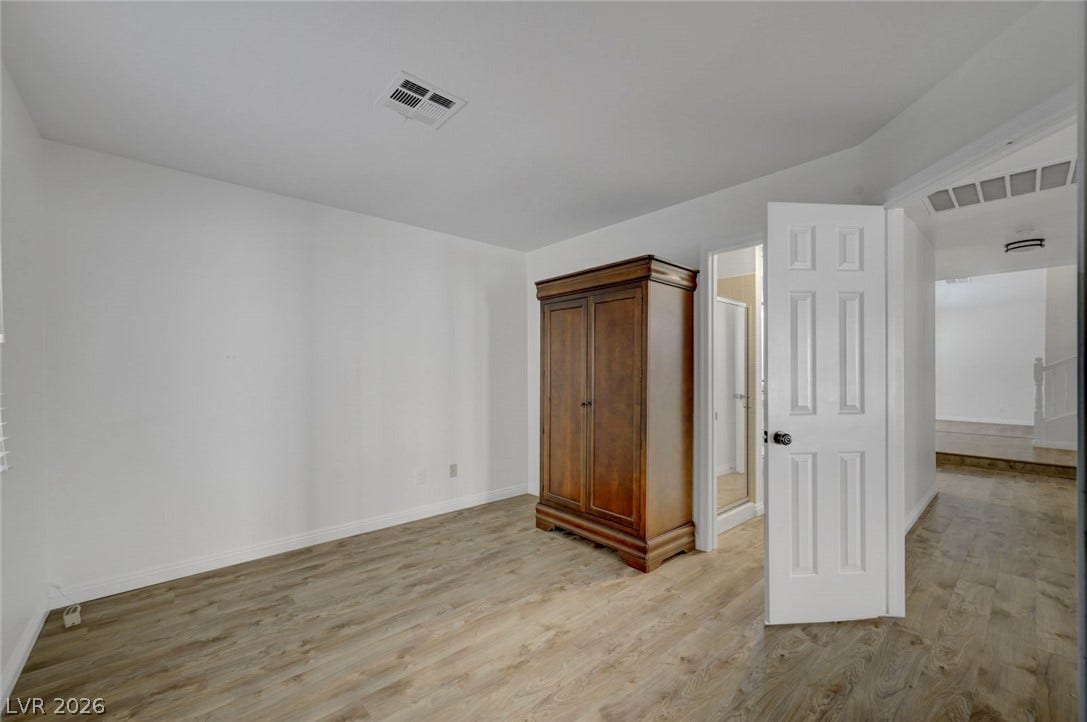31 Antero Drive, Henderson, NV 89074 Laminate flooring offers durability throughout this versatile interior space, awaiting your personal touch.