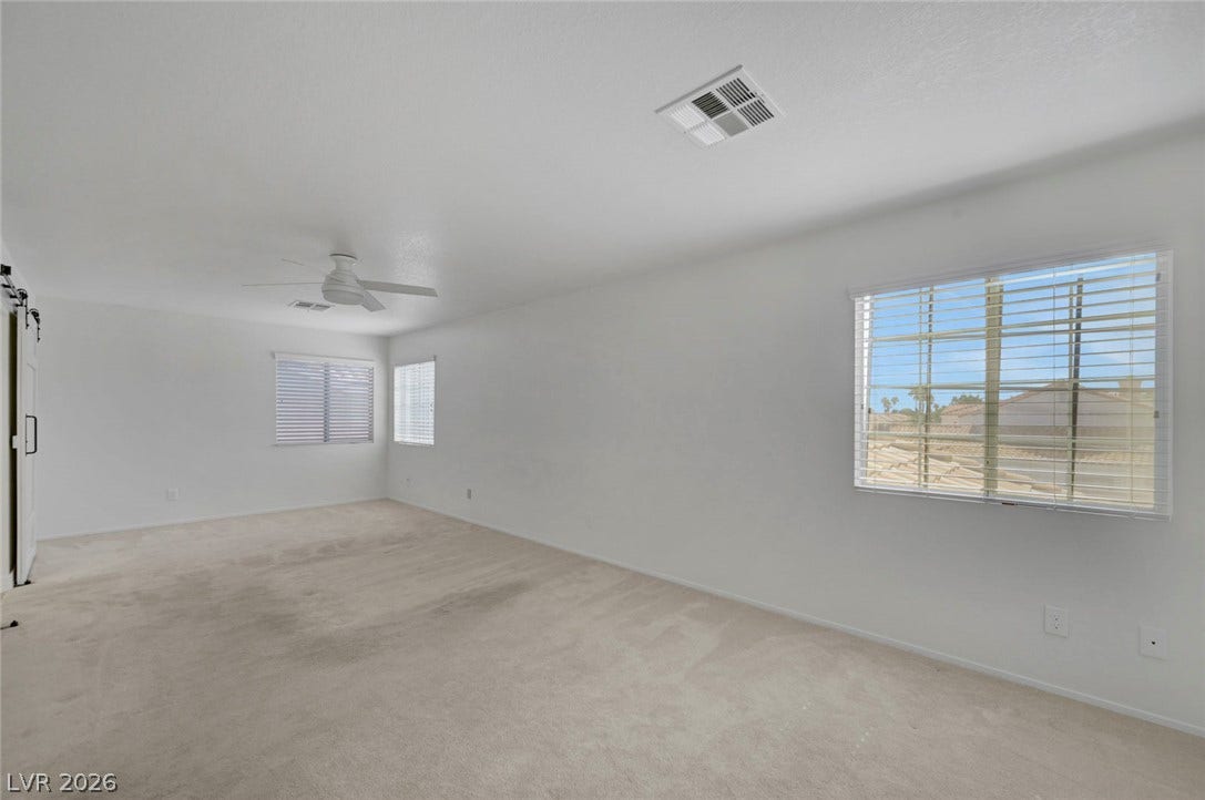 31 Antero Drive, Henderson, NV 89074 Well-lit and ready for personalization, this bedroom offers ample natural light and a comfortable feel.