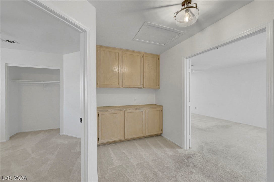 31 Antero Drive, Henderson, NV 89074 Functional built-in cabinetry provides abundant storage in this versatile hallway space.