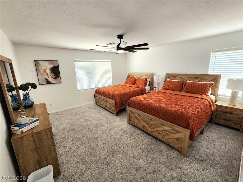 2743 Peekskill Avenue, Henderson, NV 89052 This inviting bedroom provides a comfortable and tranquil retreat.