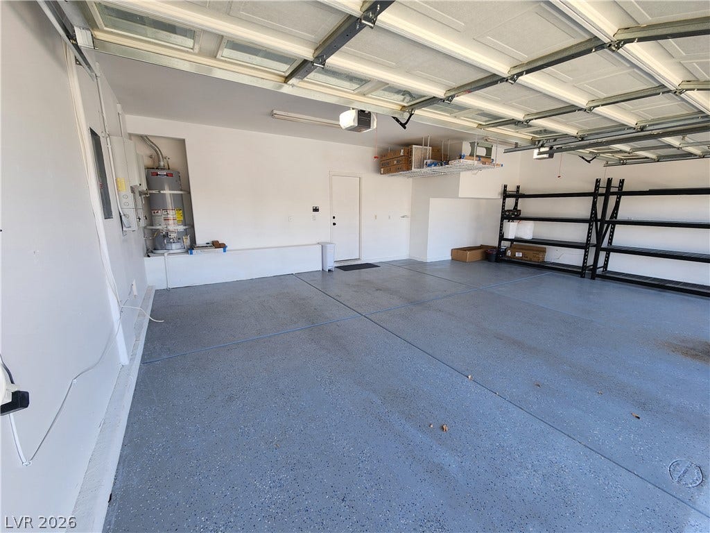 2743 Peekskill Avenue, Henderson, NV 89052 This spacious garage offers excellent storage solutions and a pristine epoxy floor.
