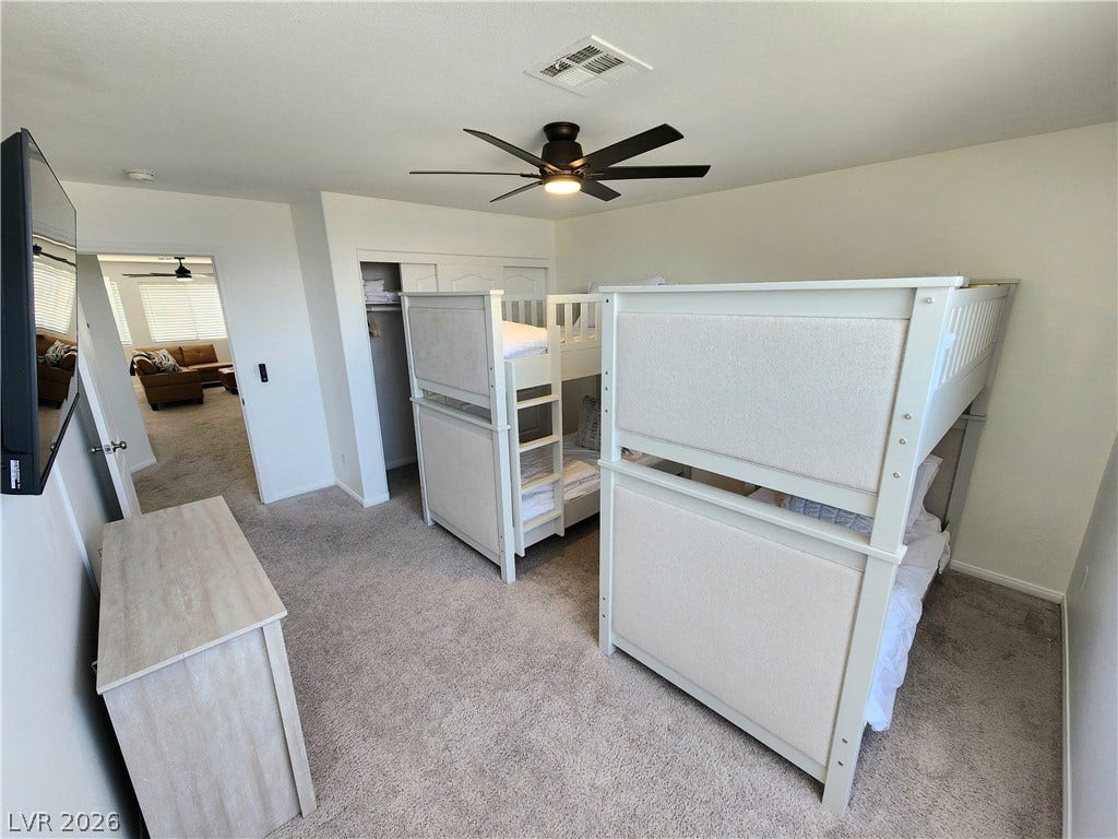 2743 Peekskill Avenue, Henderson, NV 89052 This spacious bedroom offers ample comfort and versatility for residents.