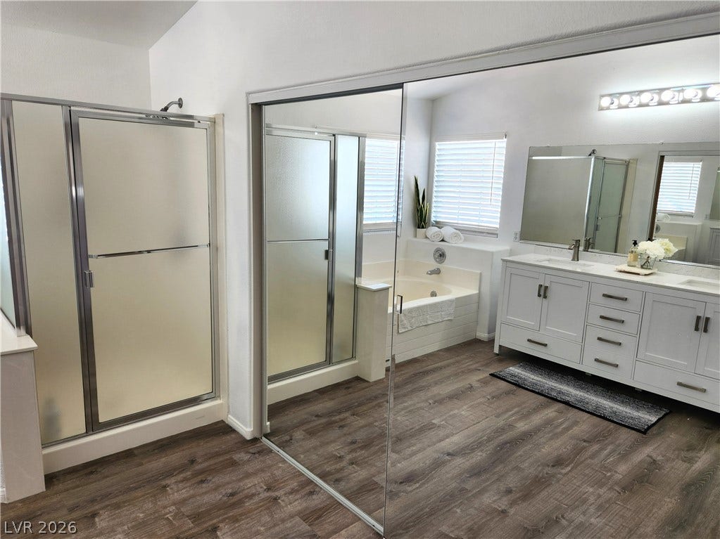 2743 Peekskill Avenue, Henderson, NV 89052 This spacious bathroom offers a relaxing soaking tub, a separate shower, and a stylish double vanity.