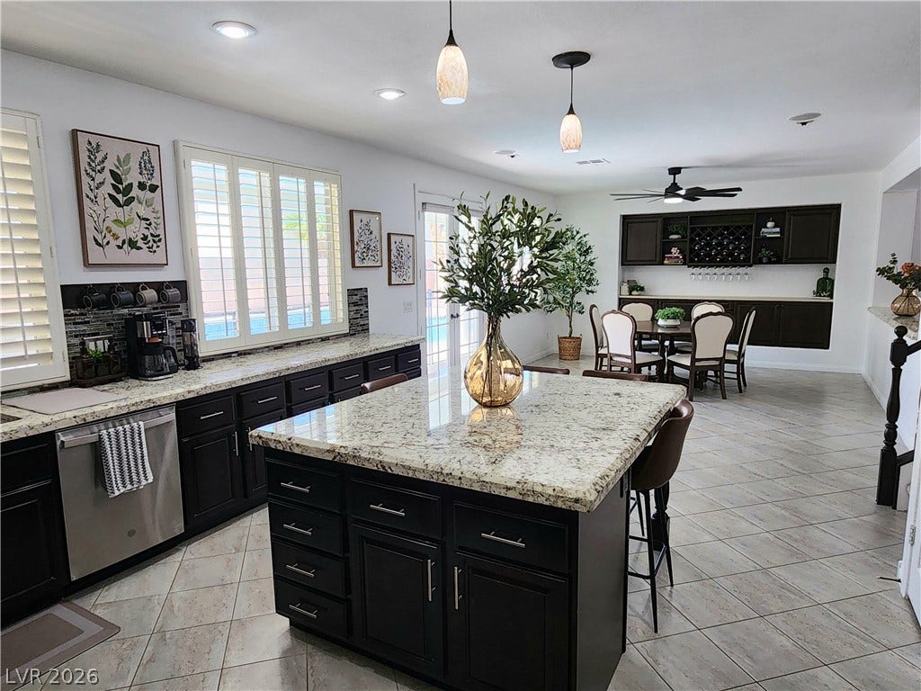 2743 Peekskill Avenue, Henderson, NV 89052 This open concept kitchen and dining area provides a perfect space for entertaining.