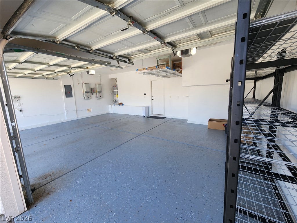 2743 Peekskill Avenue, Henderson, NV 89052 This spacious garage offers versatile utility and organized storage solutions.