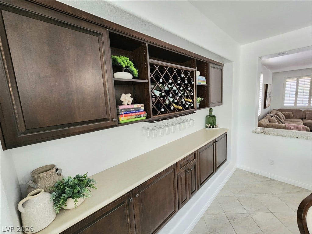 2743 Peekskill Avenue, Henderson, NV 89052 This built-in bar area offers convenient entertaining and seamless storage solutions.