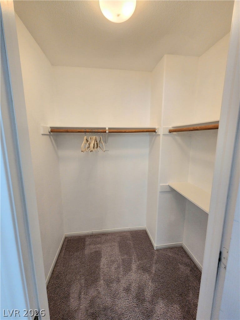 2743 Peekskill Avenue, Henderson, NV 89052 This spacious walk-in closet offers ample storage and organization solutions.