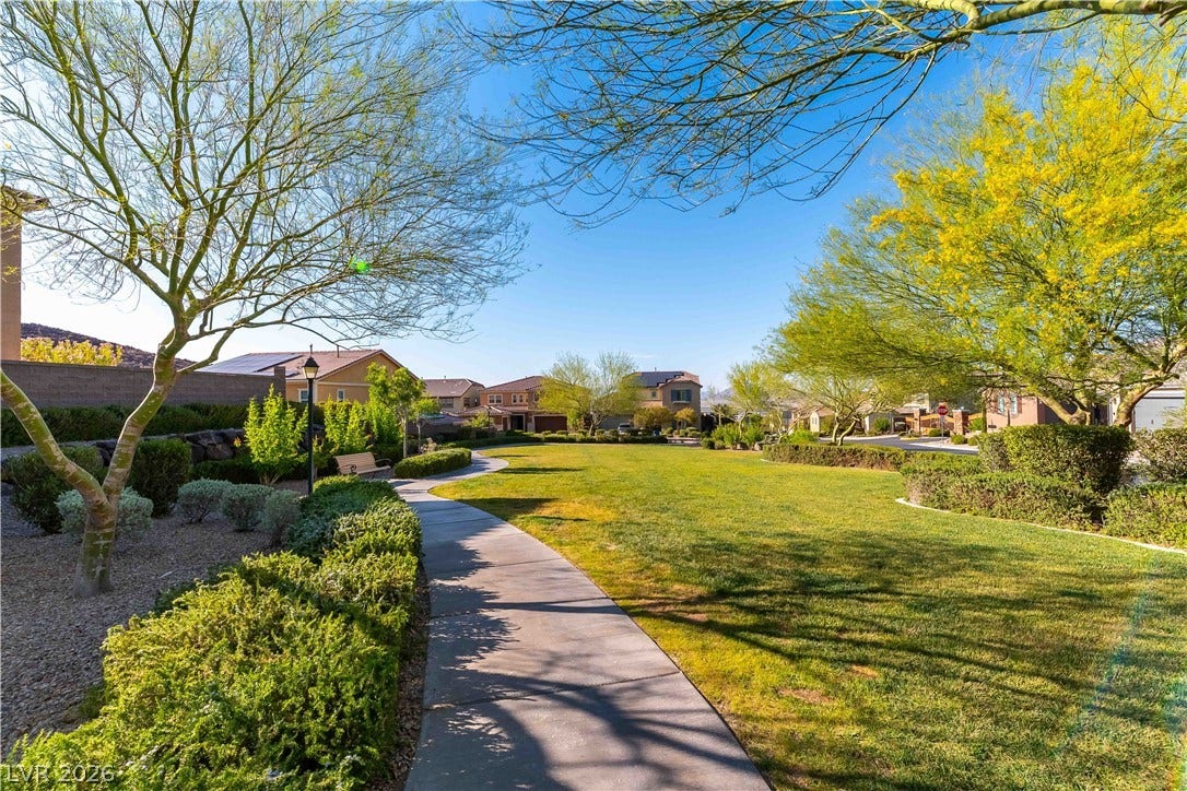 900 San Laurent Court, Henderson, NV 89012 Green spaces and pathways provide a serene environment in this community.
