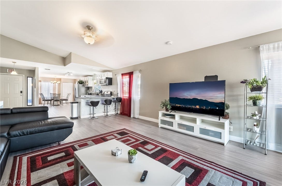 3111 Belvedere Drive, Henderson, NV 89014 An inviting open-concept layout connects the kitchen, dining area, and living room seamlessly.