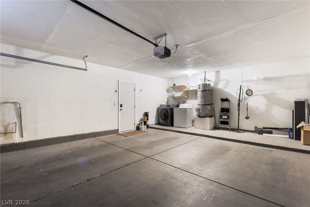 3111 Belvedere Drive, Henderson, NV 89014 A spacious garage provides ample room for parking and offers convenient laundry hookups.