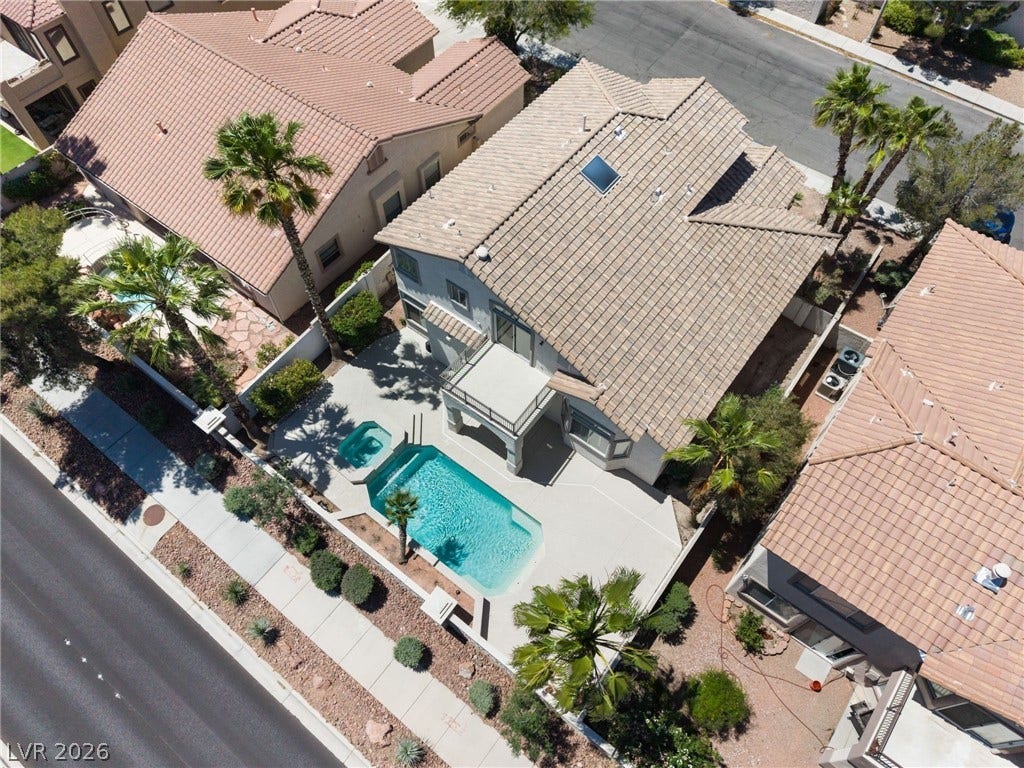 1278 Autumn Wind Way, Henderson, NV 89052 An aerial perspective reveals a serene pool and spa nestled within a private backyard oasis.