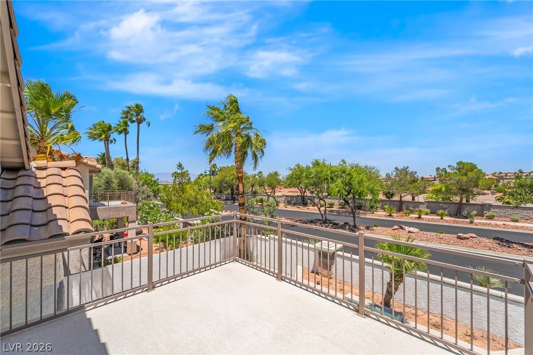 1278 Autumn Wind Way, Henderson, NV 89052 A spacious private balcony offers expansive views of the surrounding neighborhood and vibrant greenery.