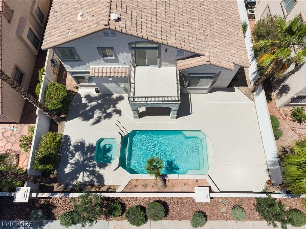 1278 Autumn Wind Way, Henderson, NV 89052 An aerial perspective reveals a private backyard oasis, perfect for relaxation and outdoor enjoyment.
