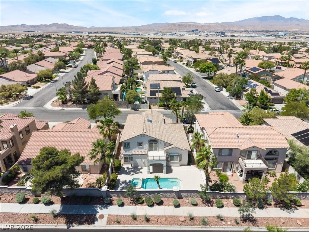 1278 Autumn Wind Way, Henderson, NV 89052 An aerial perspective reveals a private pool nestled within a charming residential neighborhood.