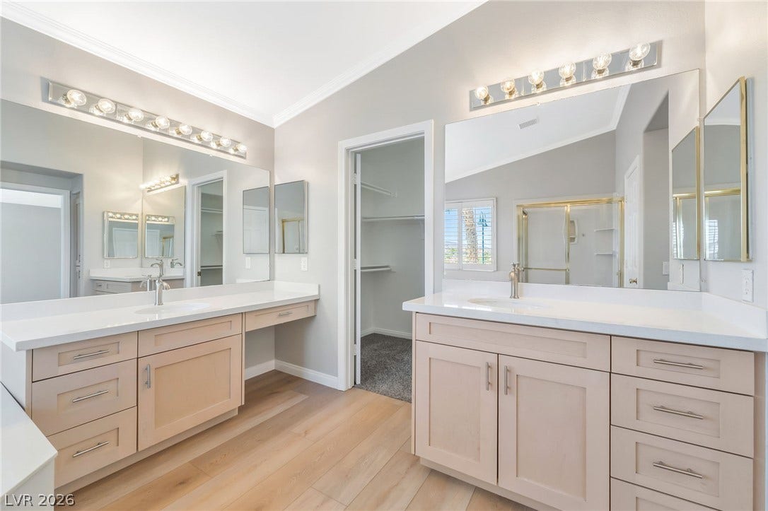 1278 Autumn Wind Way, Henderson, NV 89052 Dual vanities with ample counter space create a functional and elegant primary bathroom.