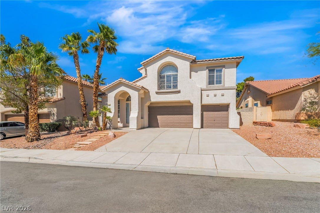 1278 Autumn Wind Way, Henderson, NV 89052 A desert oasis welcomes you with a broad concrete driveway leading to this stucco residence.