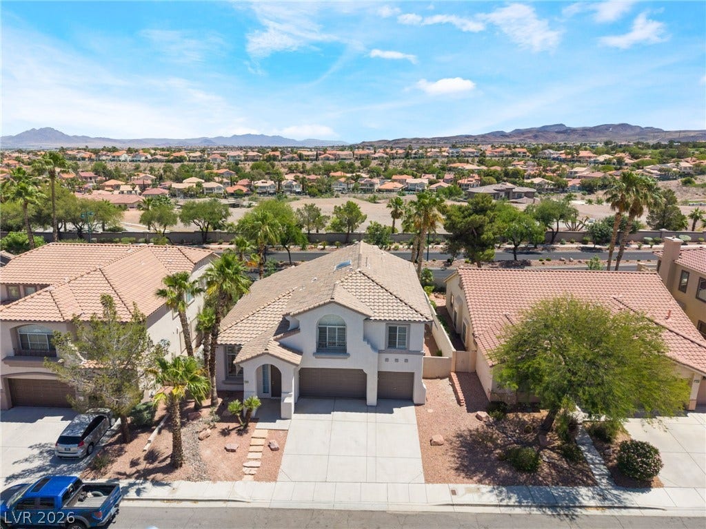 1278 Autumn Wind Way, Henderson, NV 89052 An inviting exterior with a well-maintained yard and picturesque surrounding views awaits.