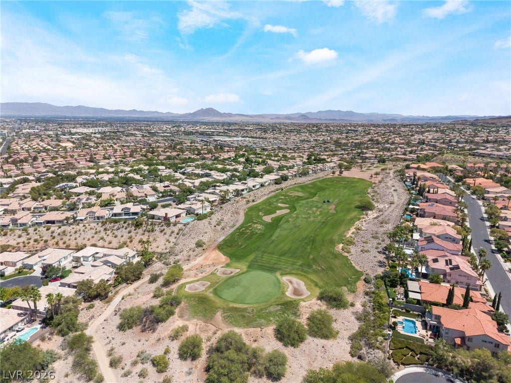 1278 Autumn Wind Way, Henderson, NV 89052 Vast desert landscape meets a thriving residential community alongside a verdant golf course.