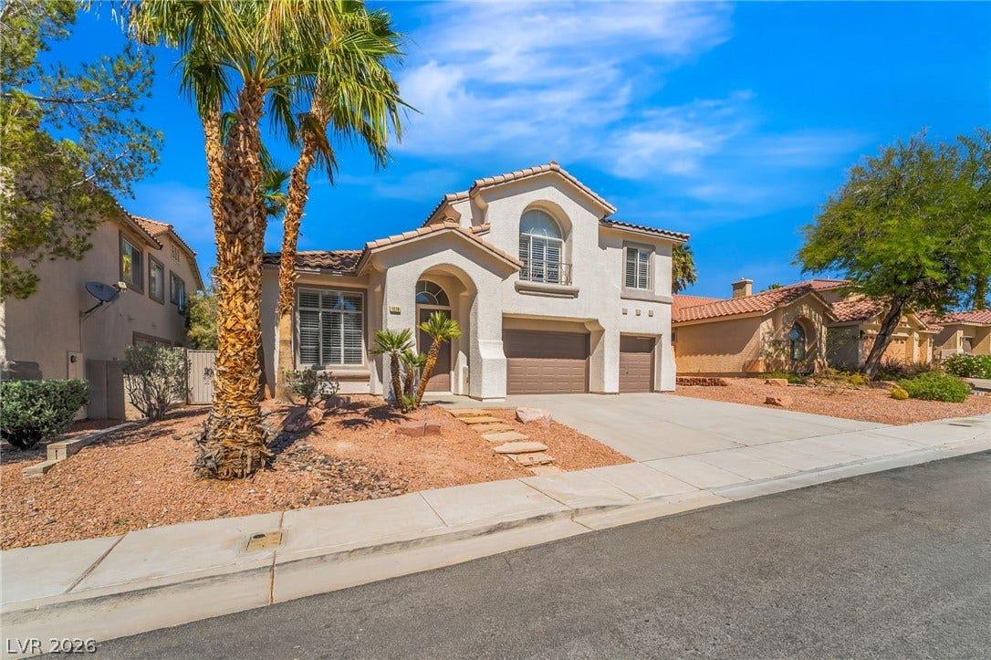 1278 Autumn Wind Way, Henderson, NV 89052 A well-maintained facade with desert landscaping and a dual garage offers inviting curb appeal.